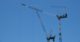 cranes construction with blue sky background