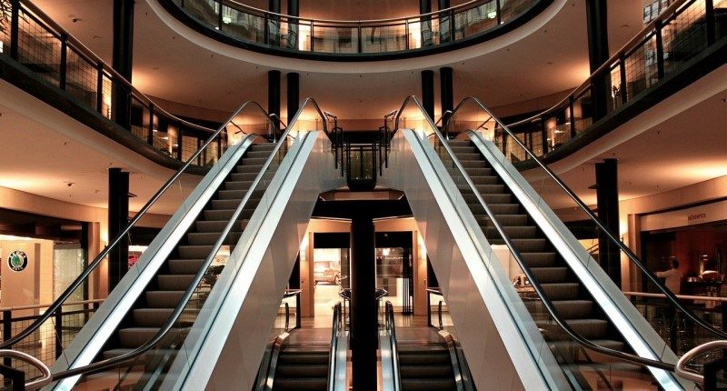 empty shopping mall with escalators