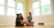 couple in new home with dog