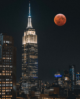 empire state building at night super moon background beautiful 
