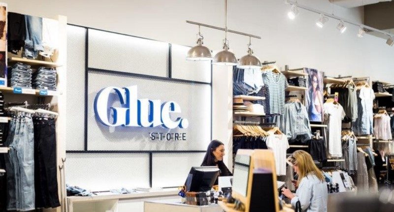 glue store accent group next athleisure store logo inside