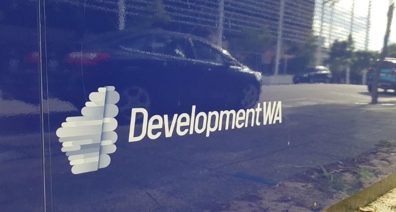 development wa logo on a sign on the street
