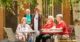 ingenia gardens old people sit and laugh at a table