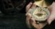 Person holding compass - resized