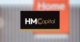 hmc capital new branding in front of blurred old logo