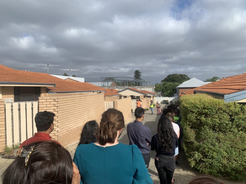 Queue of 100 and wait time of 20 minutes to inspect a small 2 bedroom unit in Perth. IMAGE: Twitter @_Liam_Murphy 12 January 2023