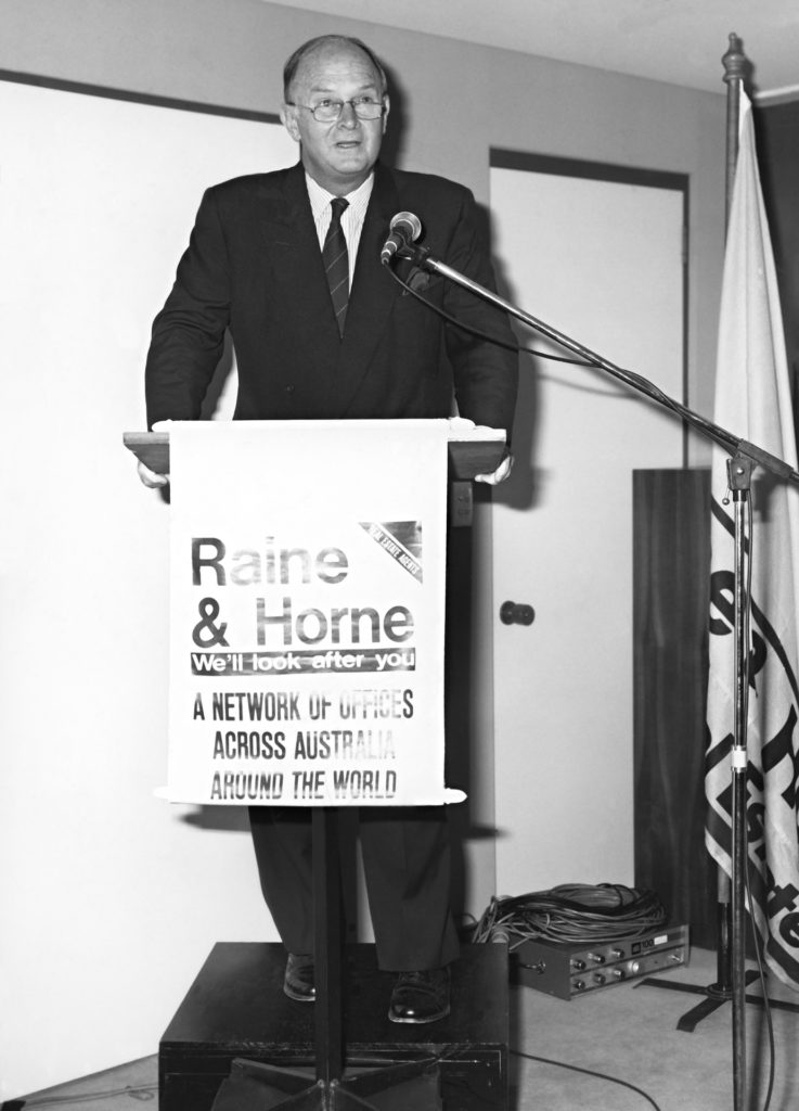 Max Raine addresses a conference. IMAGE R&H
